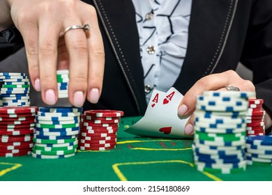 Young Woman Bets In The Casino Having A Winning Combination. Gambling