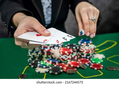 Young Woman Bets In The Casino Having A Winning Combination. Gambling