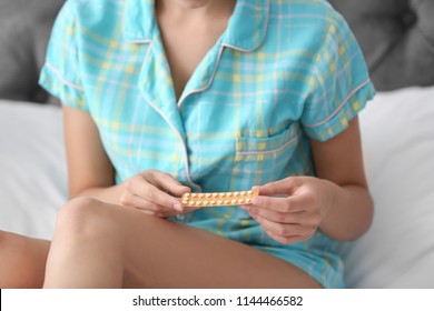 Young Woman With Birth Control Pills, Closeup. Gynecology