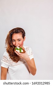 Young Woman Bites Into Wholemeal Bread Stock Photo 1692012985 ...