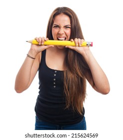 Young Woman Biting A Big Pencil