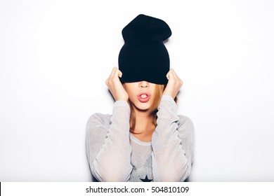 Young Woman In Black Beanie . White Background, Not Isolated