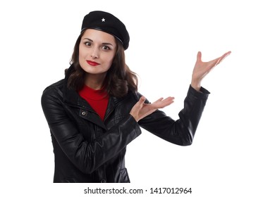 Young woman black jacket, red sweater and hat with a reference to revolutionary one hands raised with commercial offer gesture on a white background