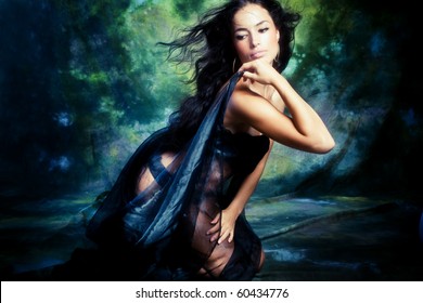 Young Woman In Black Studio Shot Fantasy Background