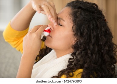 Young Woman With A Bloody Nose