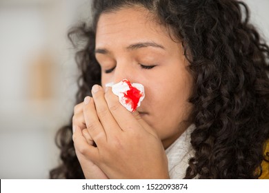 Young Woman With A Bloody Nose