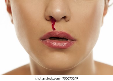 A Young Woman With A Bloody Nose