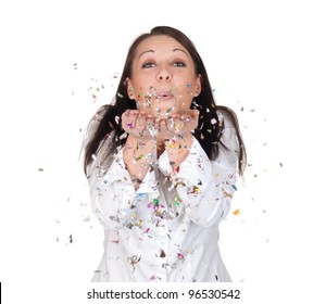 Young Woman Blowing Confetti