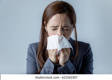 Young Woman Blowing Her Nose. Allergic Rhinitis. Hay Fever.