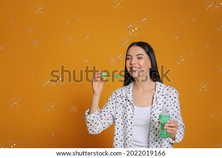 Similar – Image, Stock Photo smiling young woman leaning against a wall