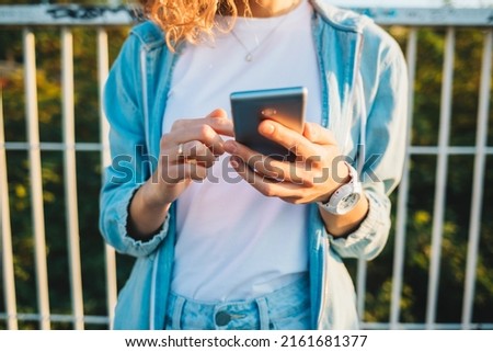 Similar – Young Woman Checking Her Mobile Phone