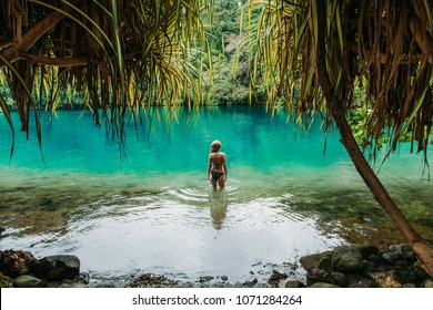 A Young Woman In Blue Lagoon In Jamaica