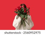 Young woman with bouquet of beautiful red roses on color background. Valentine