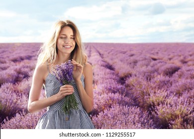 Young Woman With Bouquet In Lavender Field