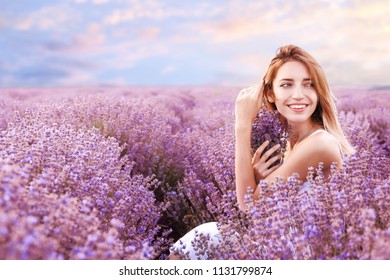 Young Woman With Bouquet In Lavender Field