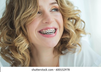 Young Woman In Braces