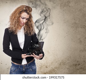 Young Woman With Broken Tablet