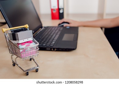 Young Woman Buying Some Gifts On Internet. Blackfriday And Cybermonday Concept. Ecommerce Sales.