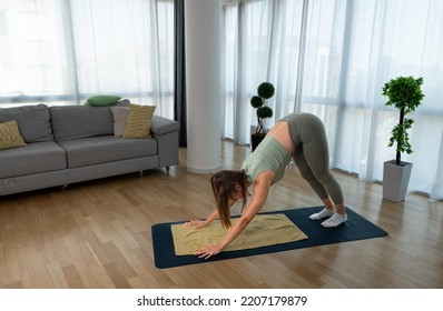 Young Woman Cancer Survivor Practicing Home Workout Yoga Training, Stretching Muscles And Breathing Exercise For Healthy Life After Long Struggle With Sickness And Pain.