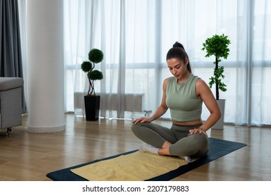 Young Woman Cancer Survivor Practicing Home Workout Yoga Training, Stretching Muscles And Breathing Exercise For Healthy Life After Long Struggle With Sickness And Pain.