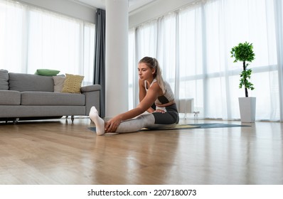 Young Woman Cancer Survivor Practicing Home Workout Yoga Training, Stretching Muscles And Breathing Exercise For Healthy Life After Long Struggle With Sickness And Pain.