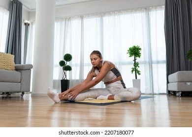 Young Woman Cancer Survivor Practicing Home Workout Yoga Training, Stretching Muscles And Breathing Exercise For Healthy Life After Long Struggle With Sickness And Pain.