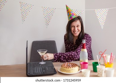 Young Woman Celebrates Birthday Drinking Alcohol Online. Videoconference Laptop Party Internet. Zoom New Technology Quarantine Social Isolation. Leisure. Video Call  Chat Congratulations Friends