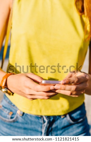 Young Woman Checking Her Mobile Phone