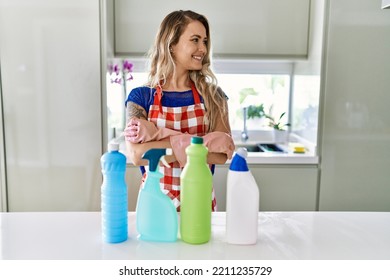 Young Woman Cleaner Smiling Confident Standing With Arms Crossed Gesture At Kitchen