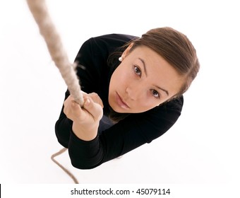 Young Woman Climbing On Rope, White Background