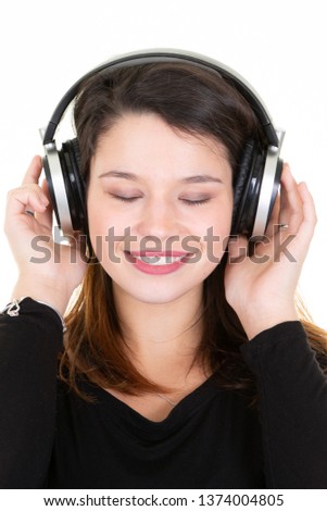 Similar – Blonde woman listening to music with her headphones