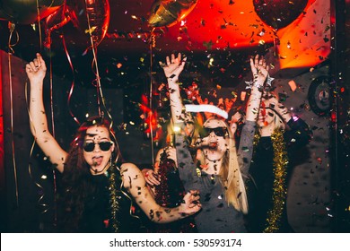 Young woman at club having fun. New year party - Powered by Shutterstock