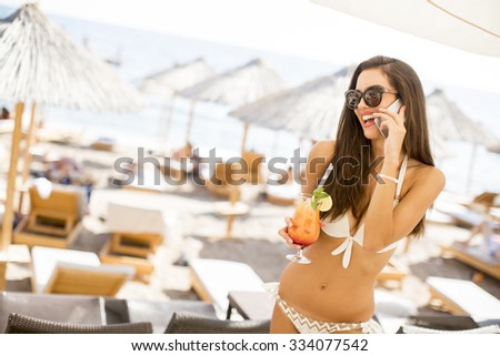 Similar – woman sitting with mixing table, in the terrace