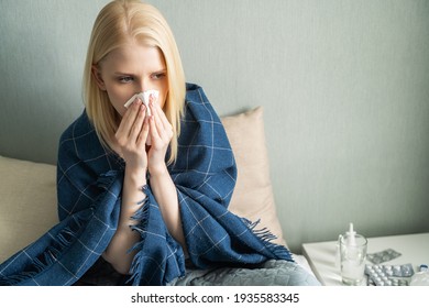 Young Woman With Cold, Using Paper Tissue