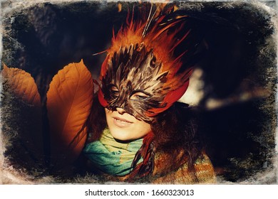 Young woman with a colorful feather face mask, old photo effect.