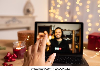 Young woman communicates with her boyfriend with a video call for Valentine's Day during the quarantine for Coronavirus COVID-19. - Powered by Shutterstock