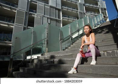 Young Woman Cooling Down After Exercise