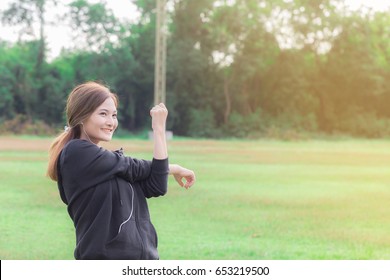 Young Woman Cooling Down Her Muscle After Exercise