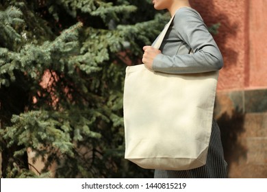 Young Woman With Cotton Bag On City Street, Closeup. Mockup For Design