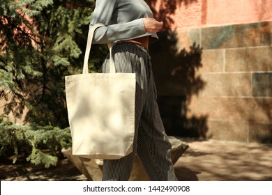 Young Woman With Cotton Bag On City Street, Closeup. Mockup For Design