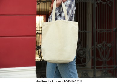 Young Woman With Cotton Bag On City Street, Closeup. Mockup For Design