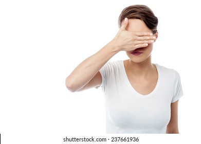 Young Woman Cover Her Eyes With Hand