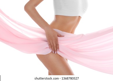Young woman covering her body with silk fabric on white background, closeup. Beauty care