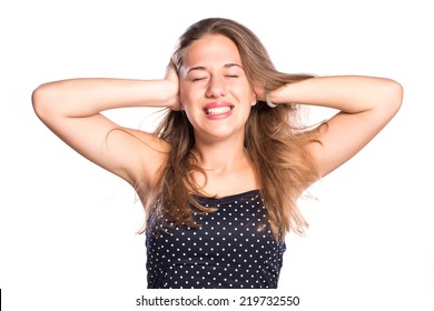 Young woman covering her ears on white isolated background - Shutterstock ID 219732550