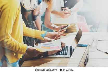 Young Woman Coworker Making Great Business Decisions.Marketing Team Discussion During Work Process Loft Office.Concept Hipsters Working Startup Idea Presentation Gadgets Wood Desk Table.Blurred