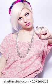 Young Woman With Creative Hair Style1980s Look. White And Pink Colored.