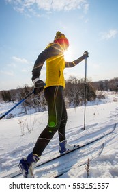 A Young Woman Cross Country Skiing In Ontario, Canada. 