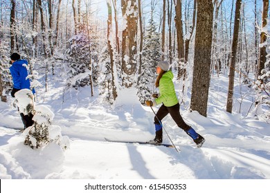 A Young Woman Cross Country Skiing In Ontario, Canada.