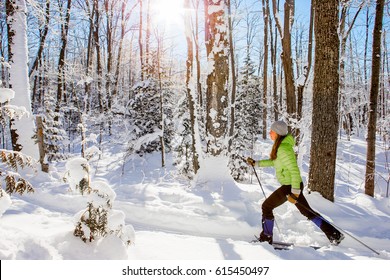 A Young Woman Cross Country Skiing In Ontario, Canada.