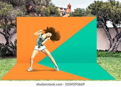 A Young Woman Dancing Aerobics, Zumba Or Fitness Dance On The Outdoor Stage